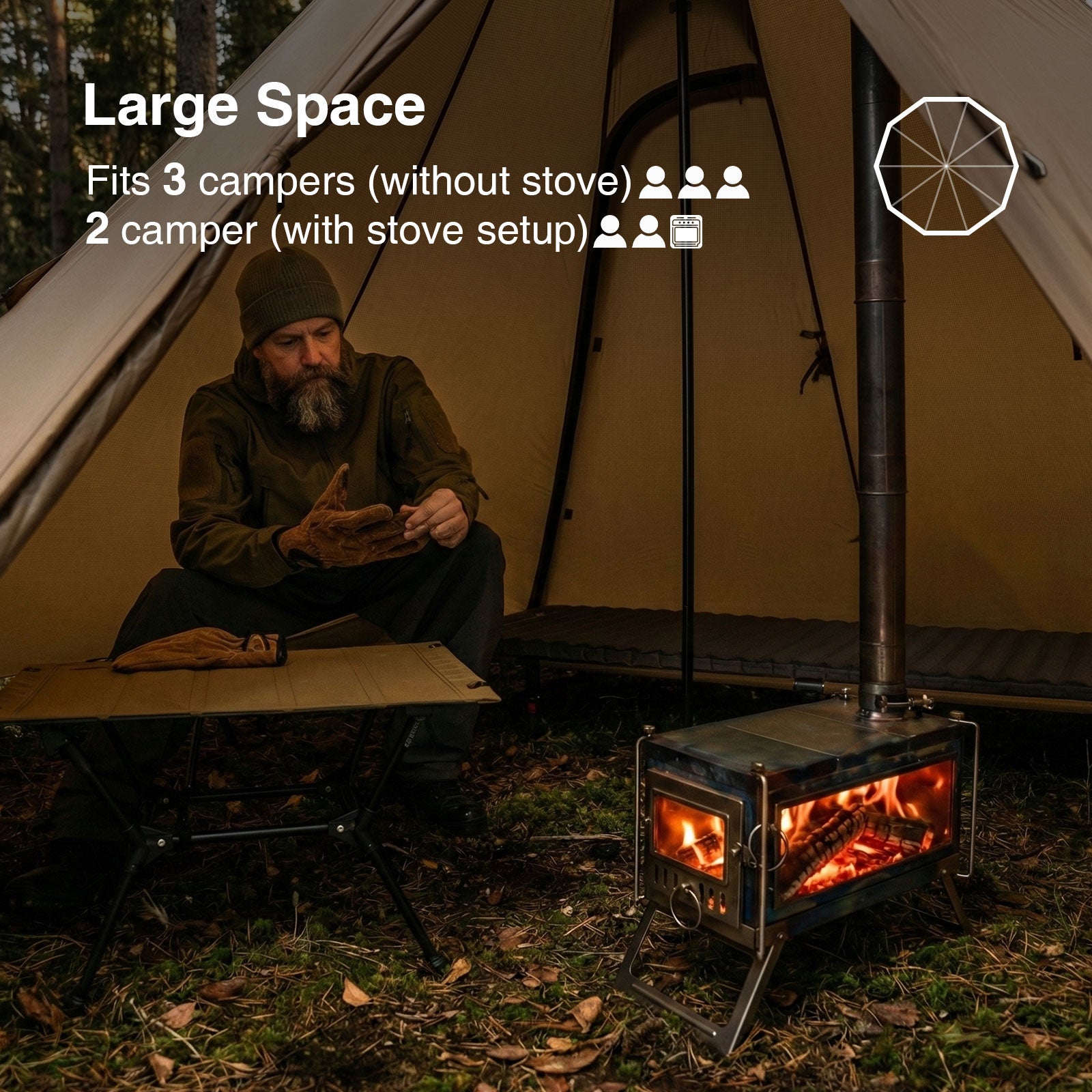 Man sitting by a tent with a stove setup, indicating space for multiple campers.