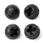 Four black geometric ball-shaped objects on a white background
