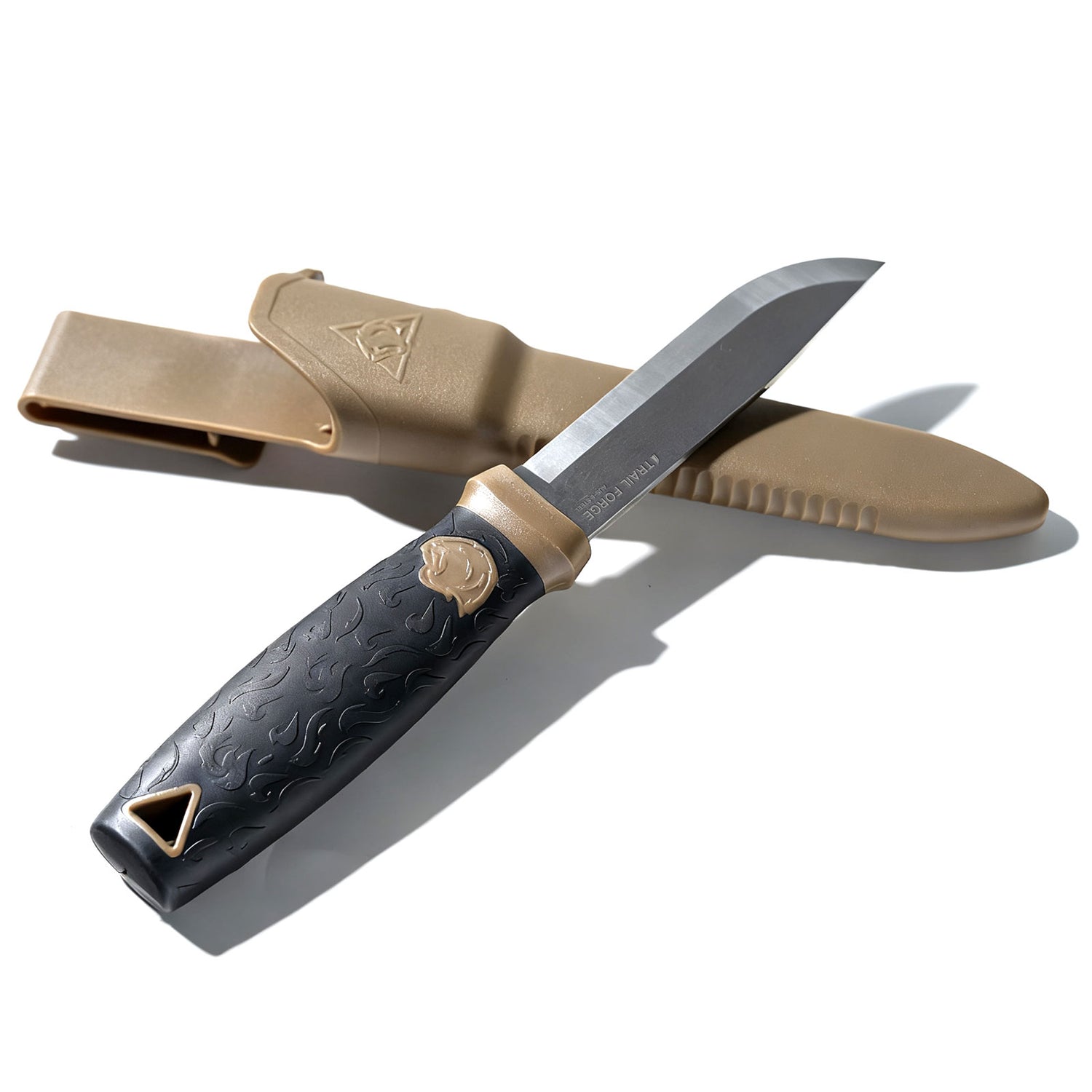 Knife with a black handle and gold accents on a white background