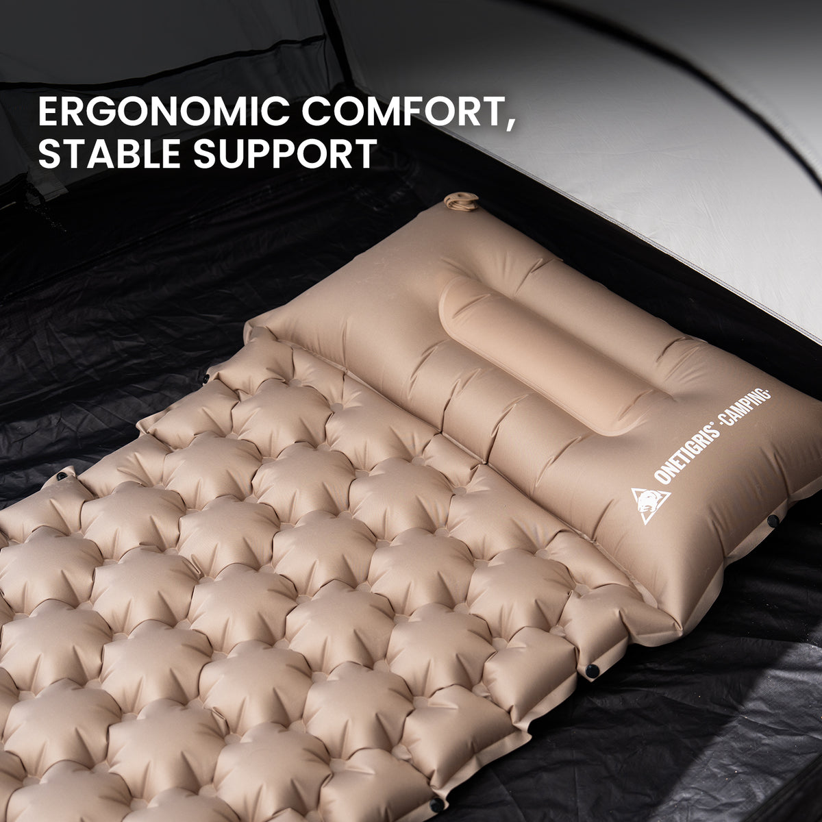 Inflatable camping mattress with onetigris camping on a black surface, emphasizing ergonomic comfort and stable support.