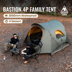 A family camping scene with a large green dome tent pitched outdoors on a dirt clearing. Two seated campers are visible beside the tent, and large text at the top reads 'BASTION 4P FAMILY TENT' with '3000mm Waterproof' and '4 Season' callouts.