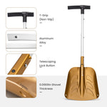 Gold shovel with T-grip and telescoping lock button on a white background