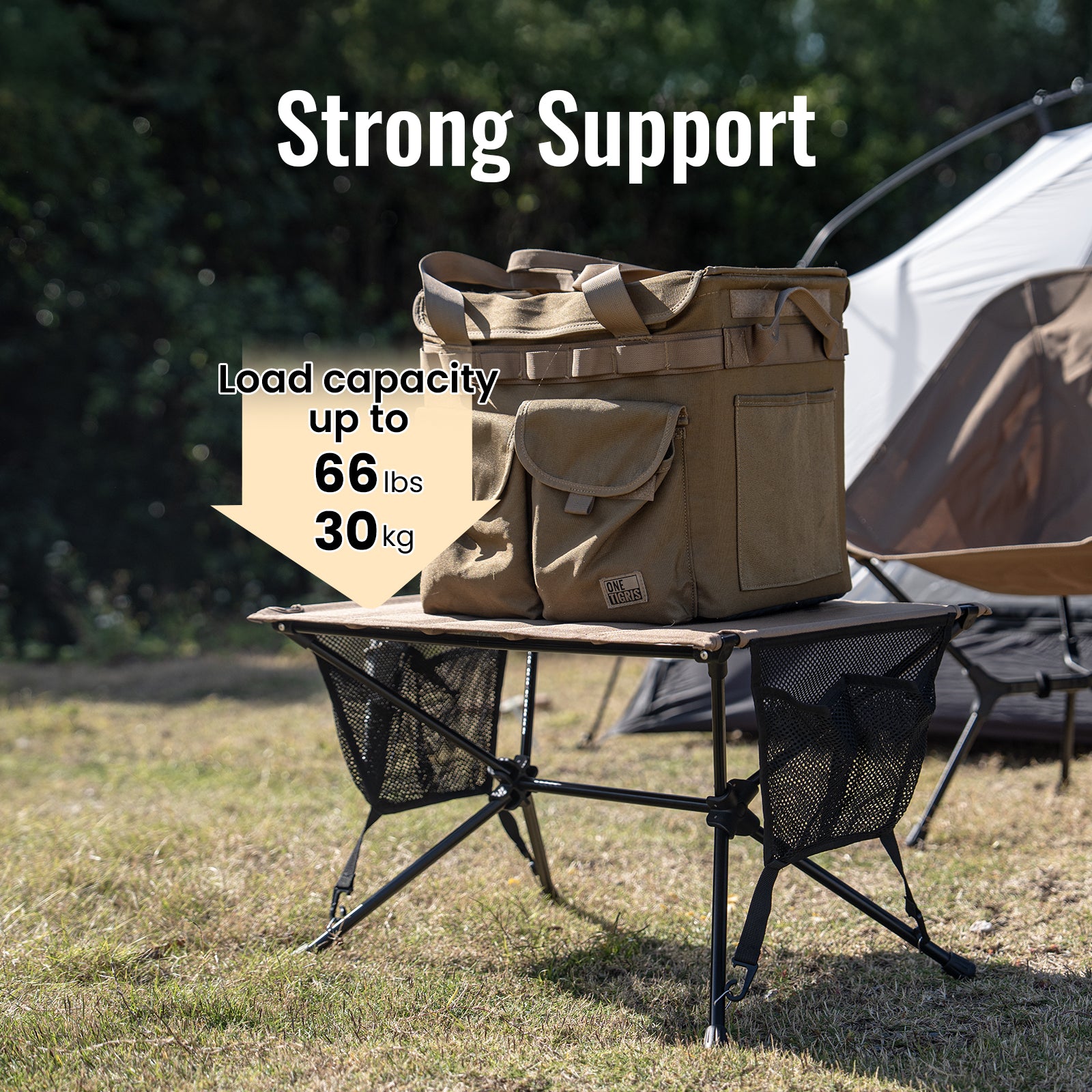 Brown bag on a camping table with text indicating load capacity, set against a natural outdoor background.