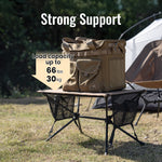 Brown bag on a camping table with text indicating load capacity, set against a natural outdoor background.